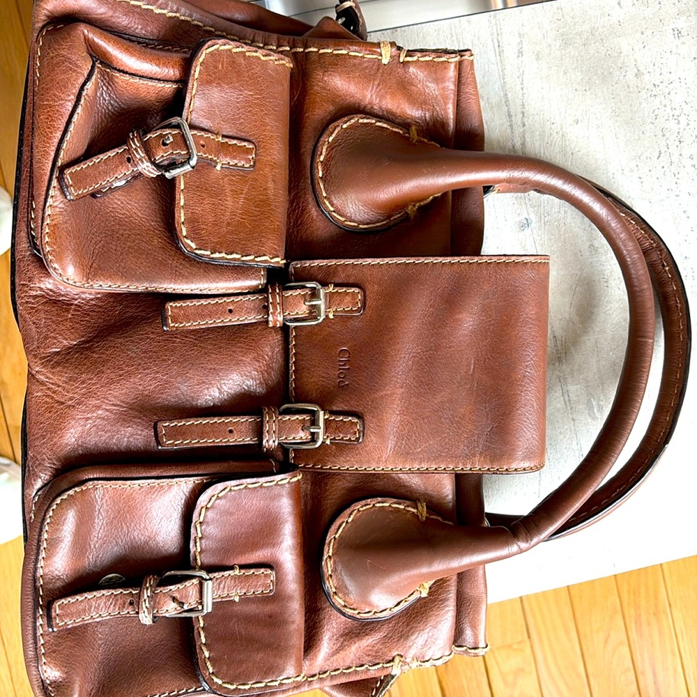 Stunning Chloe vintage brown leather handbag. interior & exterior have pockets.